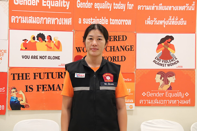 Nongluck Yanghansirikul poses in front of the Women’s Economic Empowerment and Learning Centre in Chiang Khong District, Chiang Rai Province, Thailand on 2 December 2023. Photo: UN Women/Elmer Dante